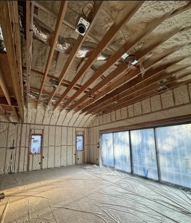 Interior walls and ceiling insulated with spray foam during new construction in Pine Hills